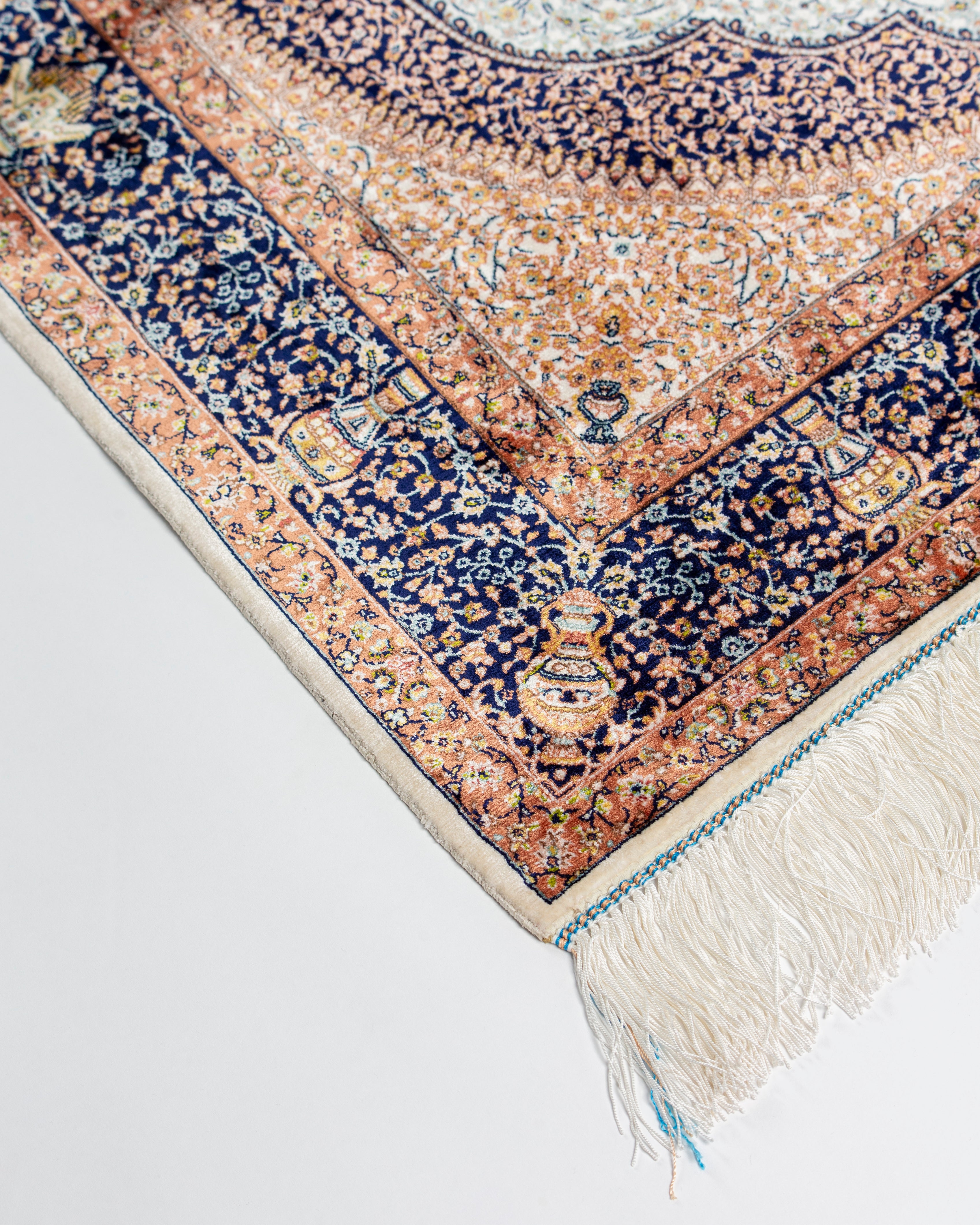 Corner spandrel detail of the Simin silk rug