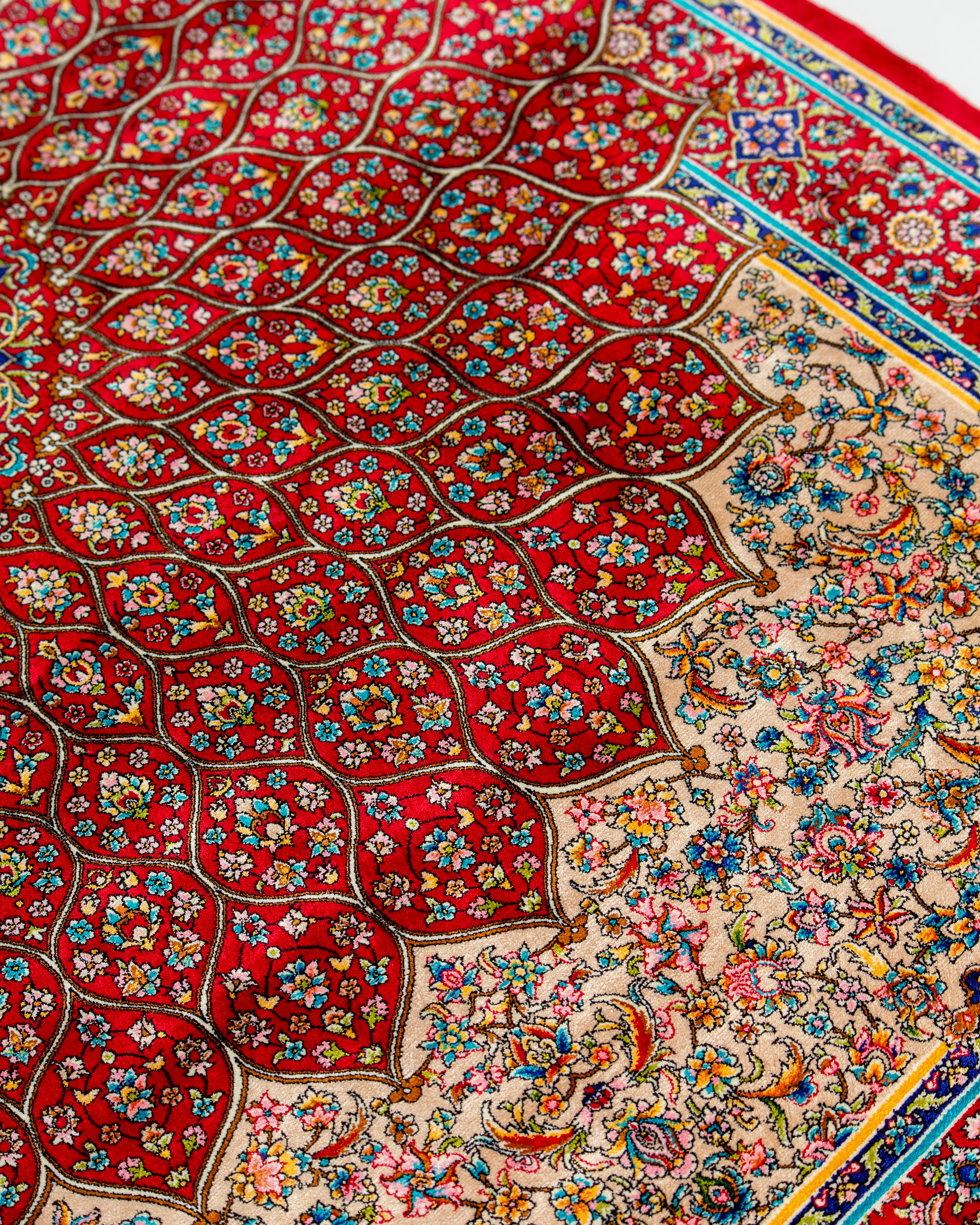 Border detail of the Soraya red Persian silk rug