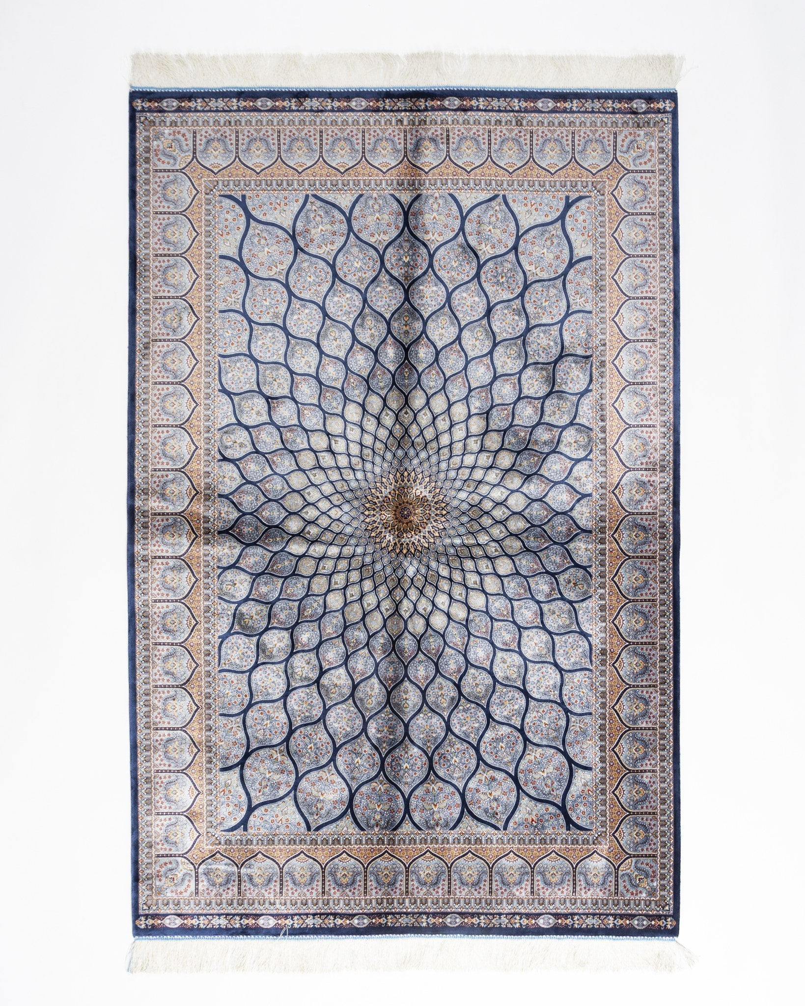 Tavoos blue silk rug 150 x 100 cms with a radial sunburst design