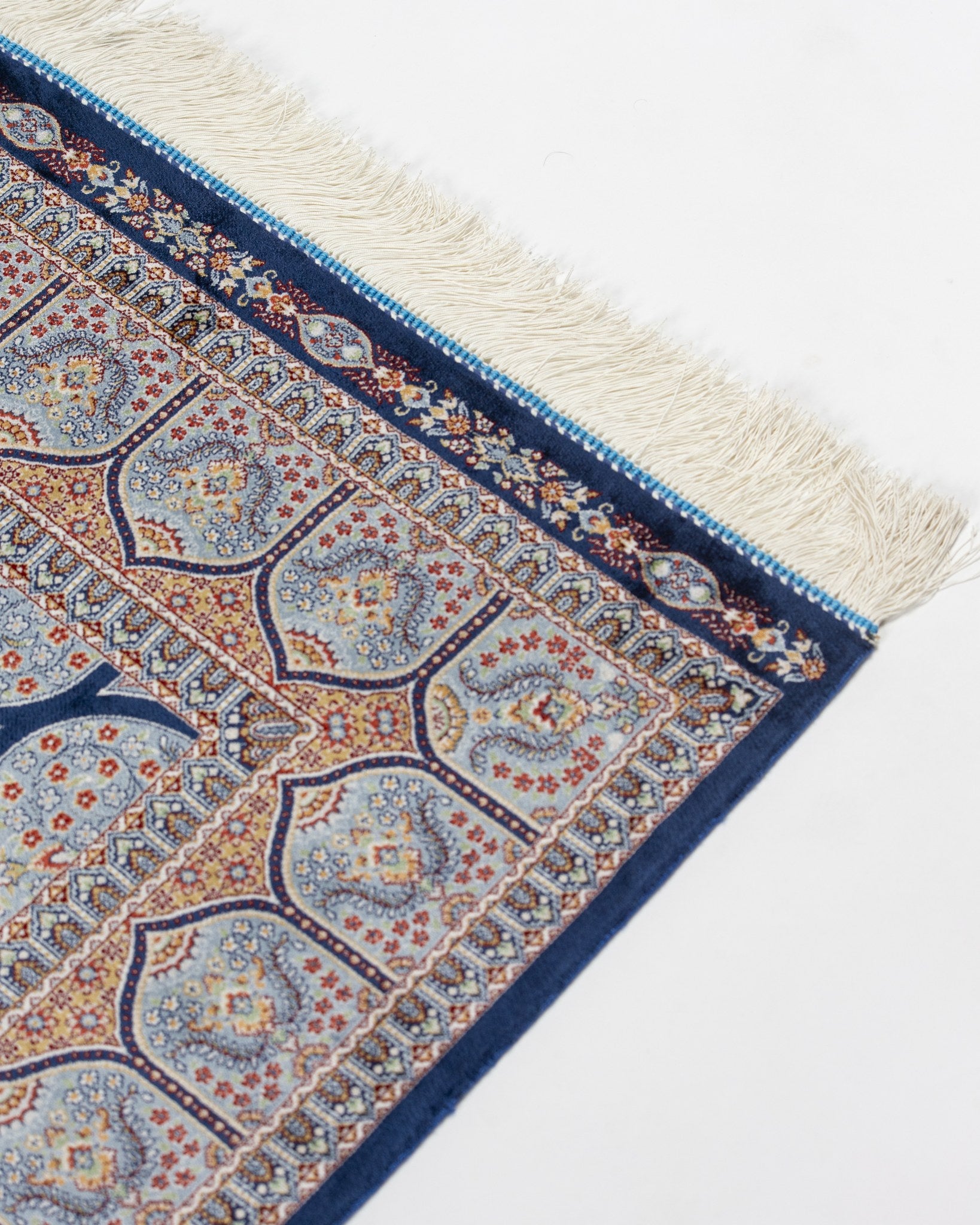 Corner border detail of the Tavoos silk rug