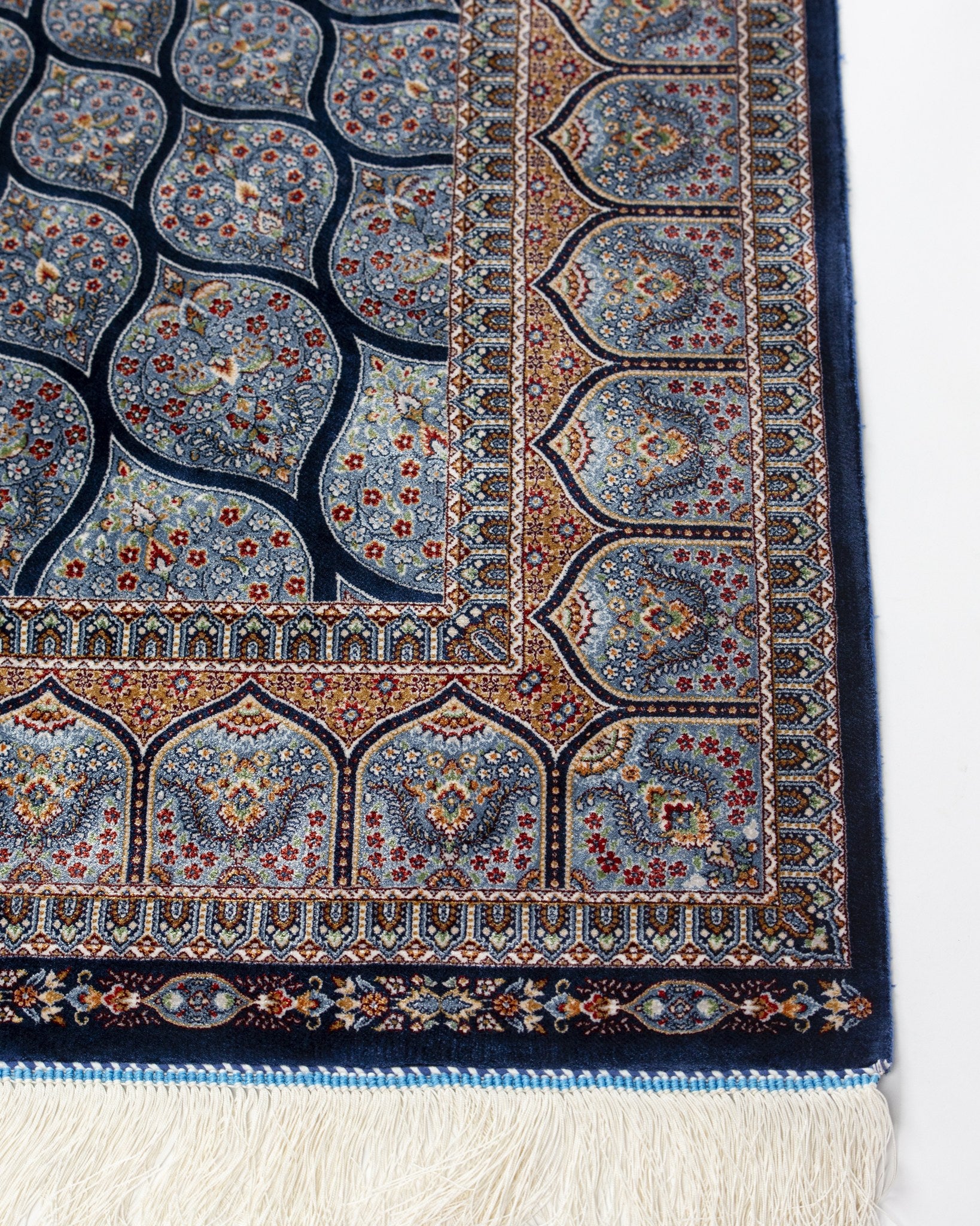 Detail of the Tavoos silk rug scale pattern