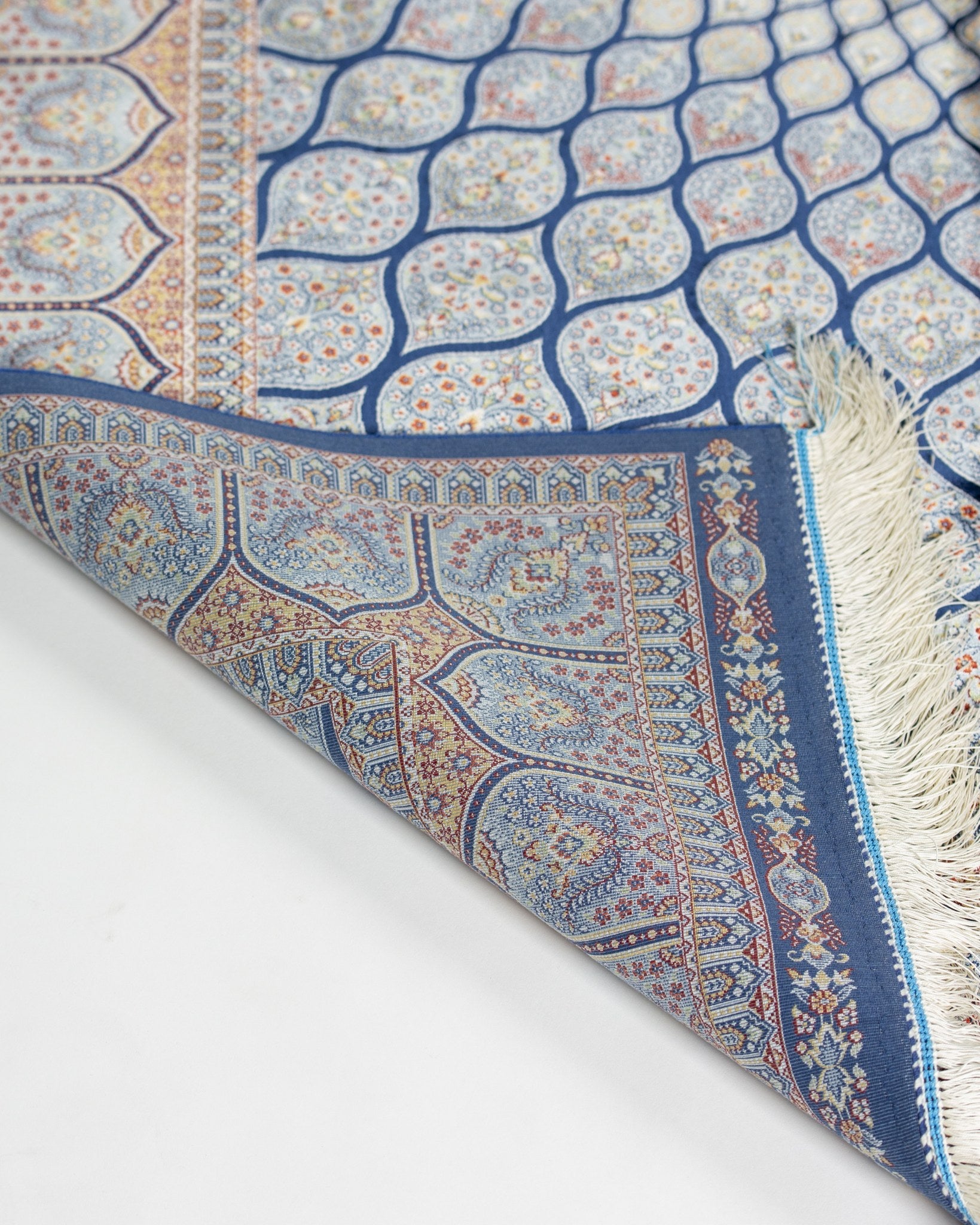 Tavoos blue silk rug pattern detail
