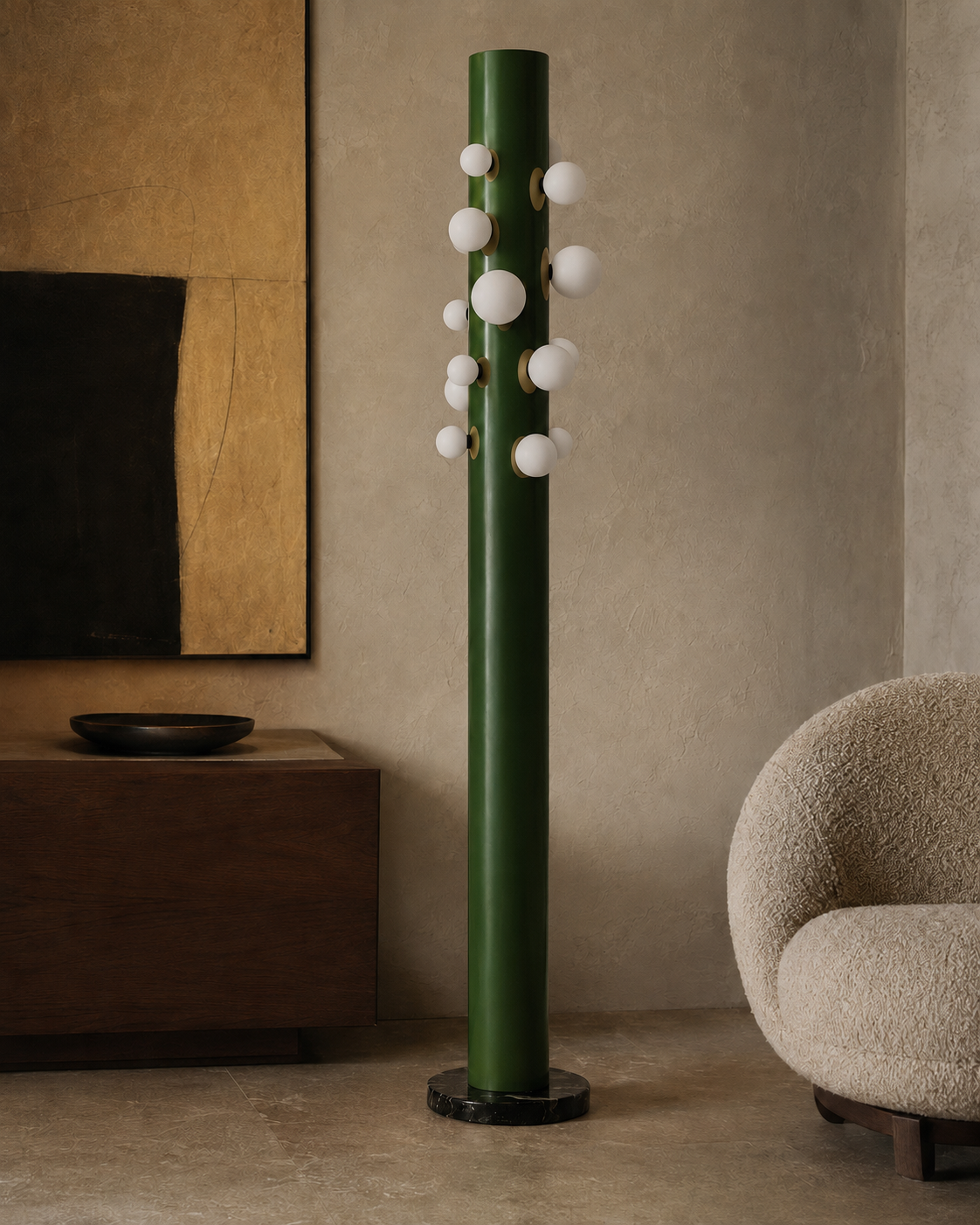 The Cactus Floor Lamp by The Qratist features a sculptural green metal column surrounded by glowing opal glass globes and anchored by a solid black marble base, creating a contemporary botanical lighting statement.