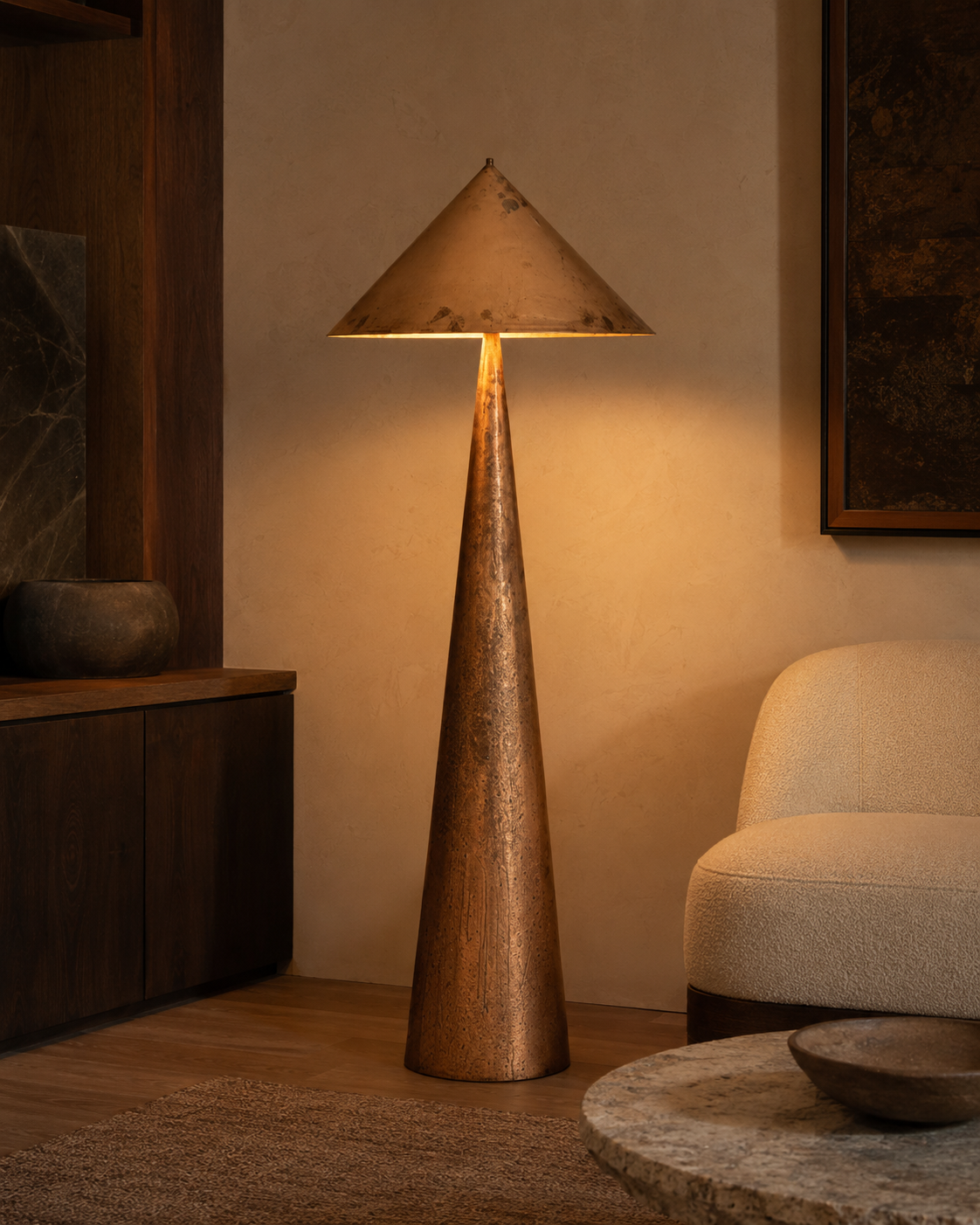 The Compass Floor Lamp by The Qratist features a handcrafted copper finished metal body with a sculptural geometric silhouette inspired by the timeless precision of a compass, creating a bold contemporary lighting statement.