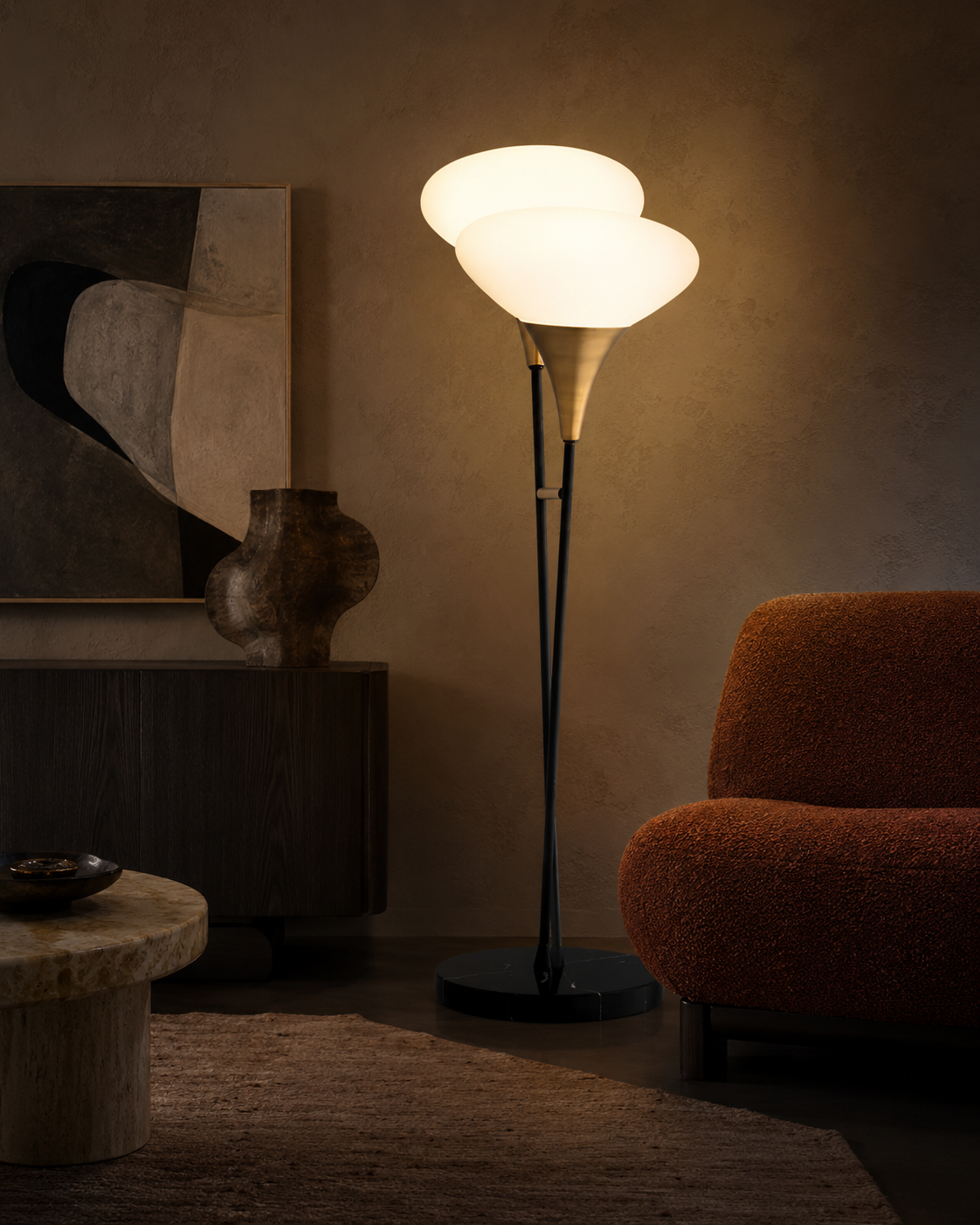The Echo Floor Lamp by The Qratist features twin white glass shades that echo one another on an antique brass finished metal frame with a solid black marble base, creating warm ambient illumination.