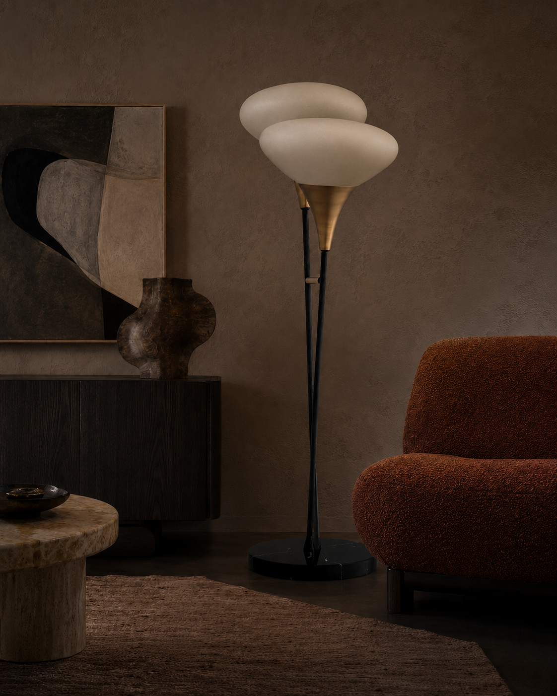 The Echo Floor Lamp by The Qratist features twin white glass shades that echo one another on an antique brass finished metal frame with a solid black marble base, creating warm ambient illumination.