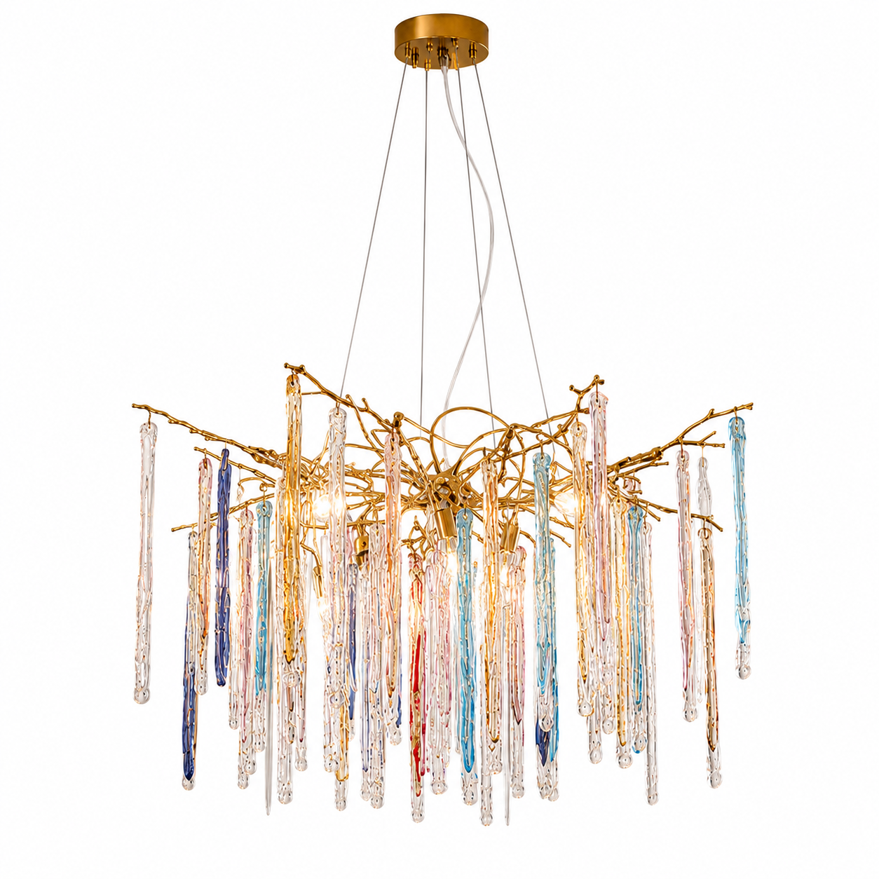 The Kryptonite Chandelier by The Qratist features handcrafted glass rods suspended from an organic brass framework, creating a bold sculptural statement inspired by crystalline formations.