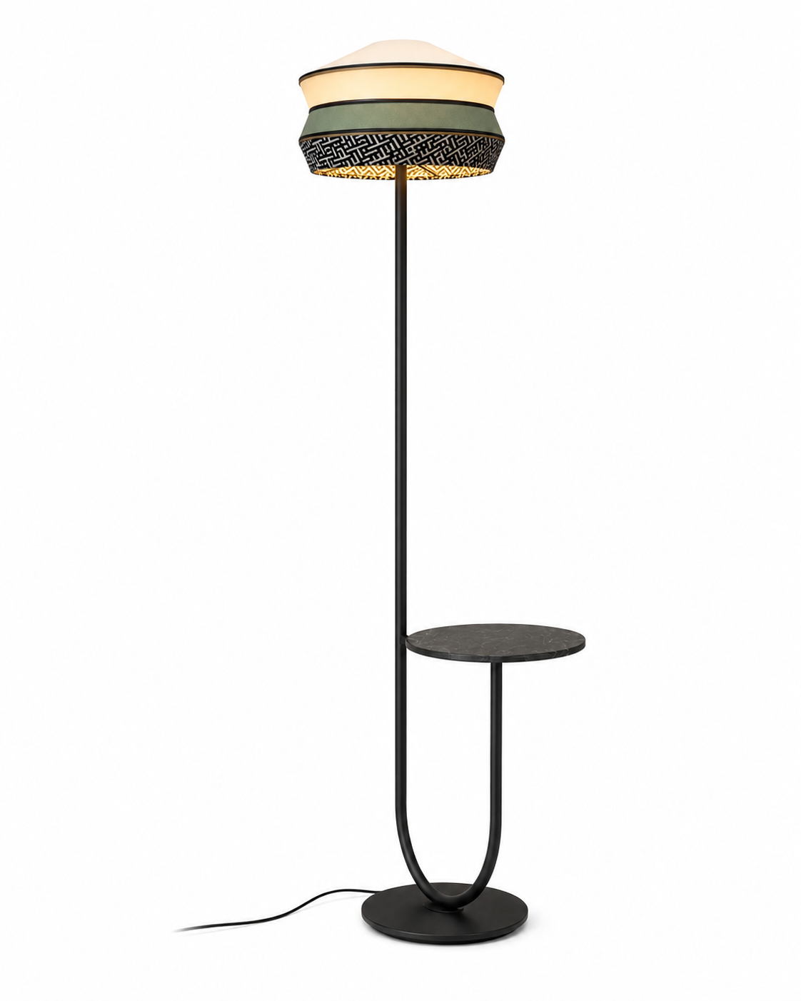 The Parasol Floor Lamp by The Qratist features a layered fabric shade suspended on a sculptural black stainless steel frame with an integrated circular side table, creating an elegant multifunctional lighting statement.