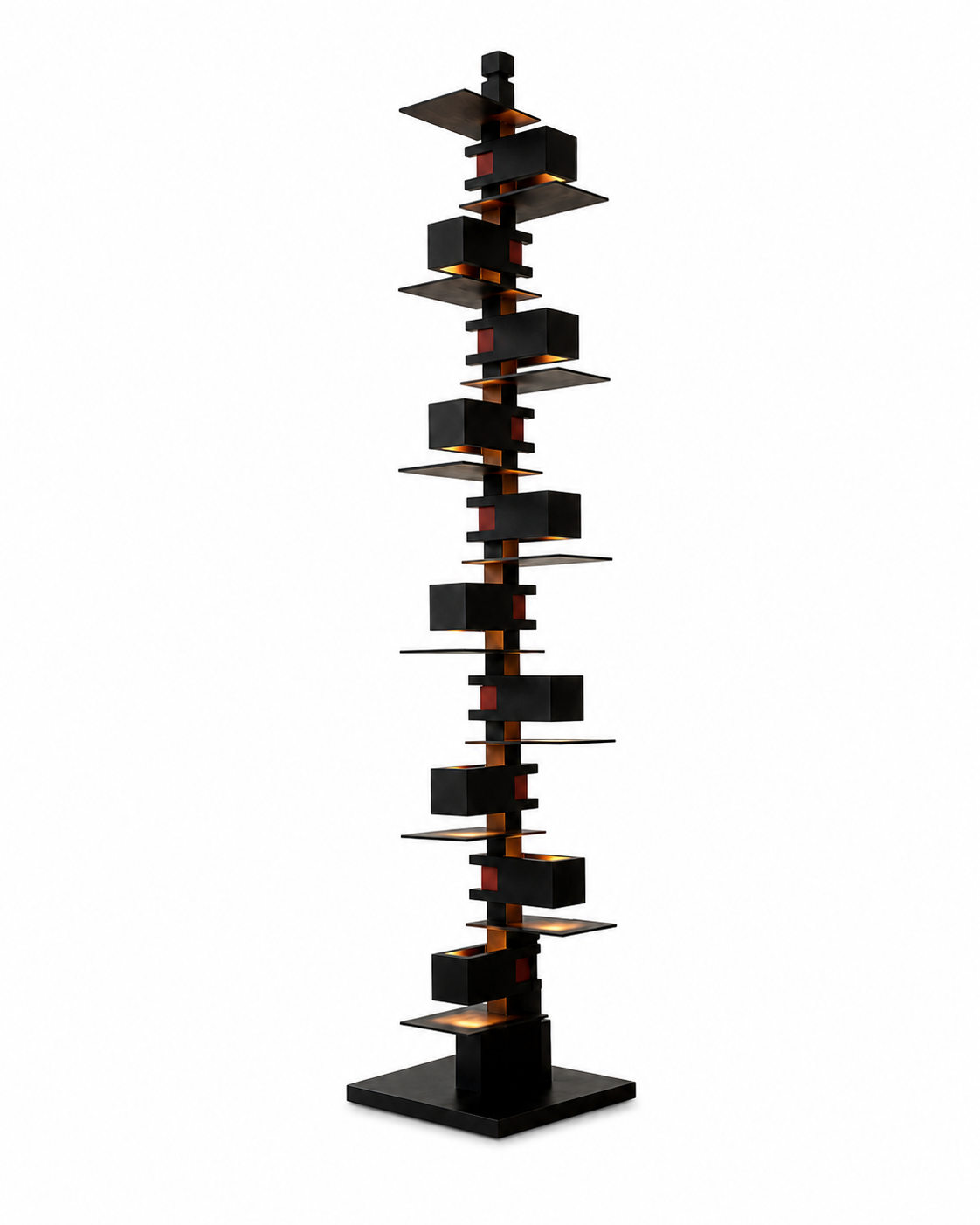 The Skyscraper Floor Lamp by The Qratist features a sculptural black stainless steel structure with stacked geometric forms and concealed warm illumination inspired by the silhouette of a modern city skyline.