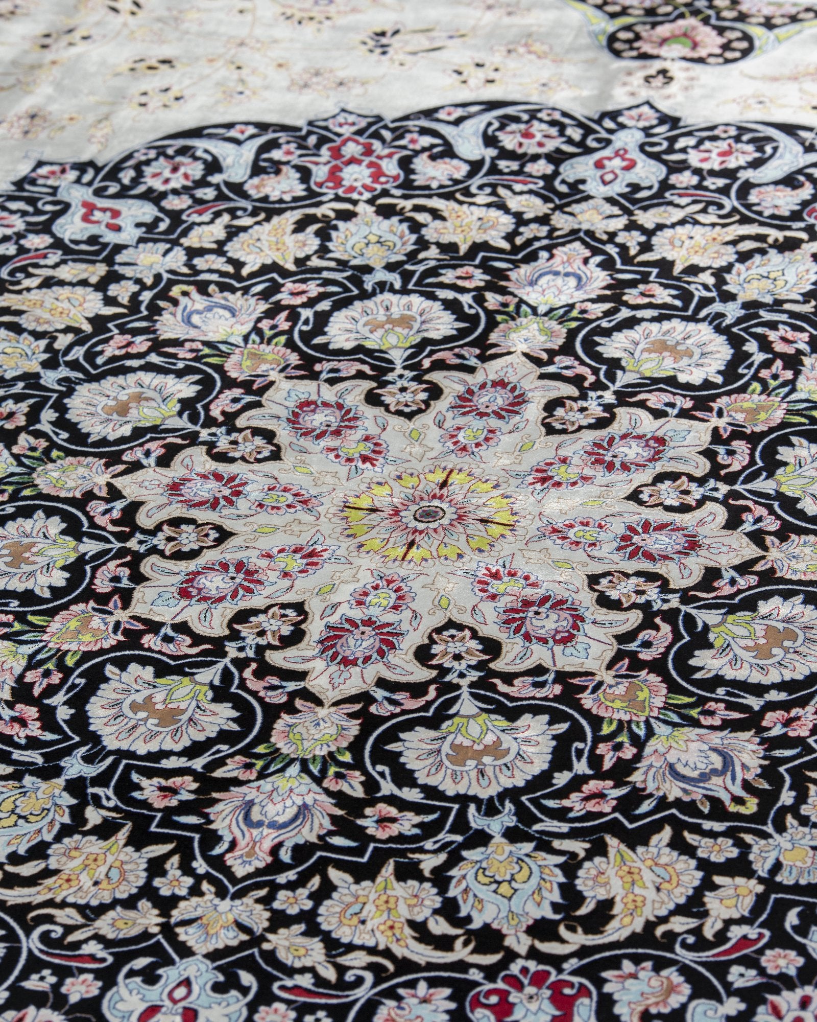 Yalda silk carpet angled view showing ivory and navy tones, 300 x 400 cm - Tabeer Homes Dubai