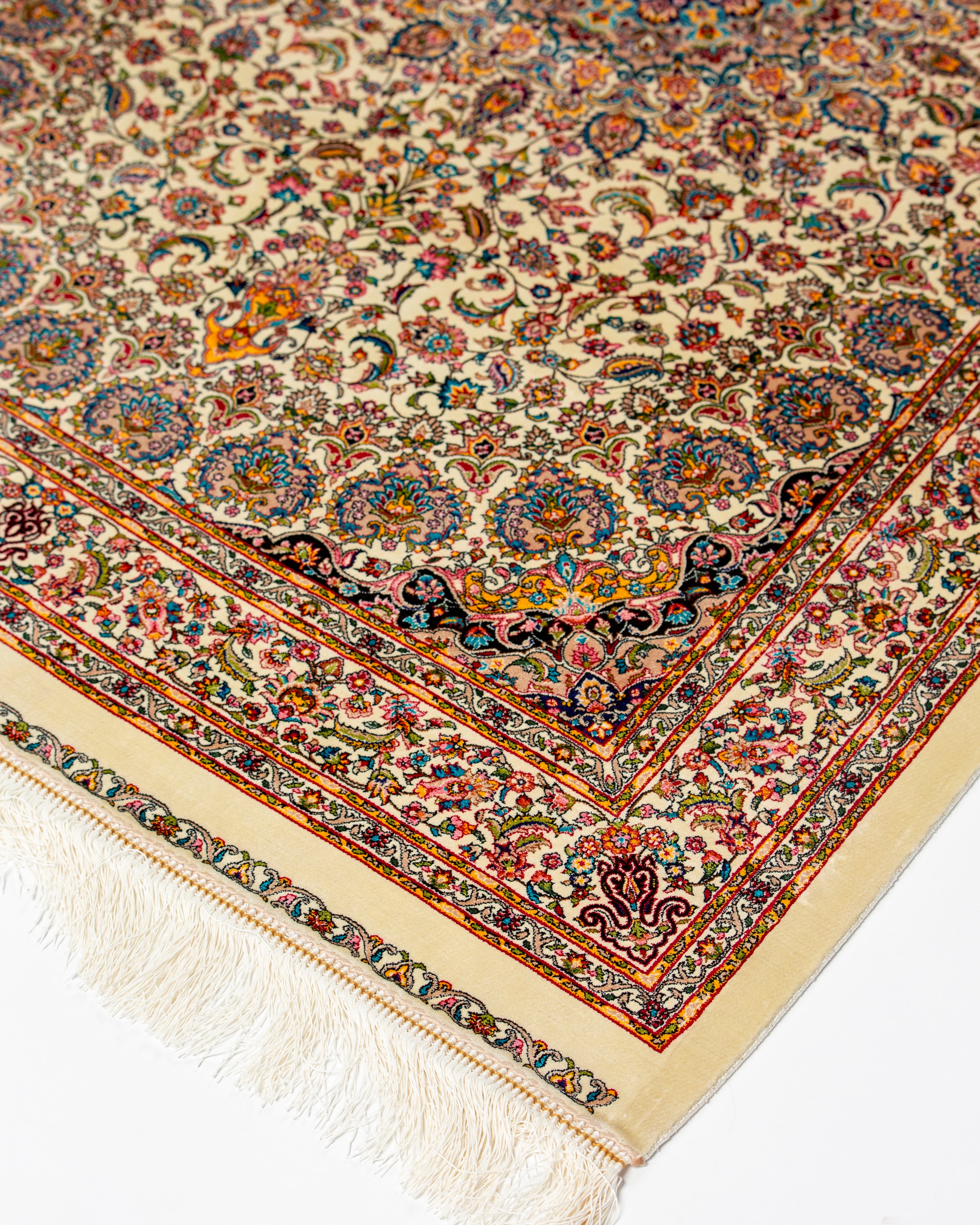 Corner and floral detail of the Yasmin silk rug