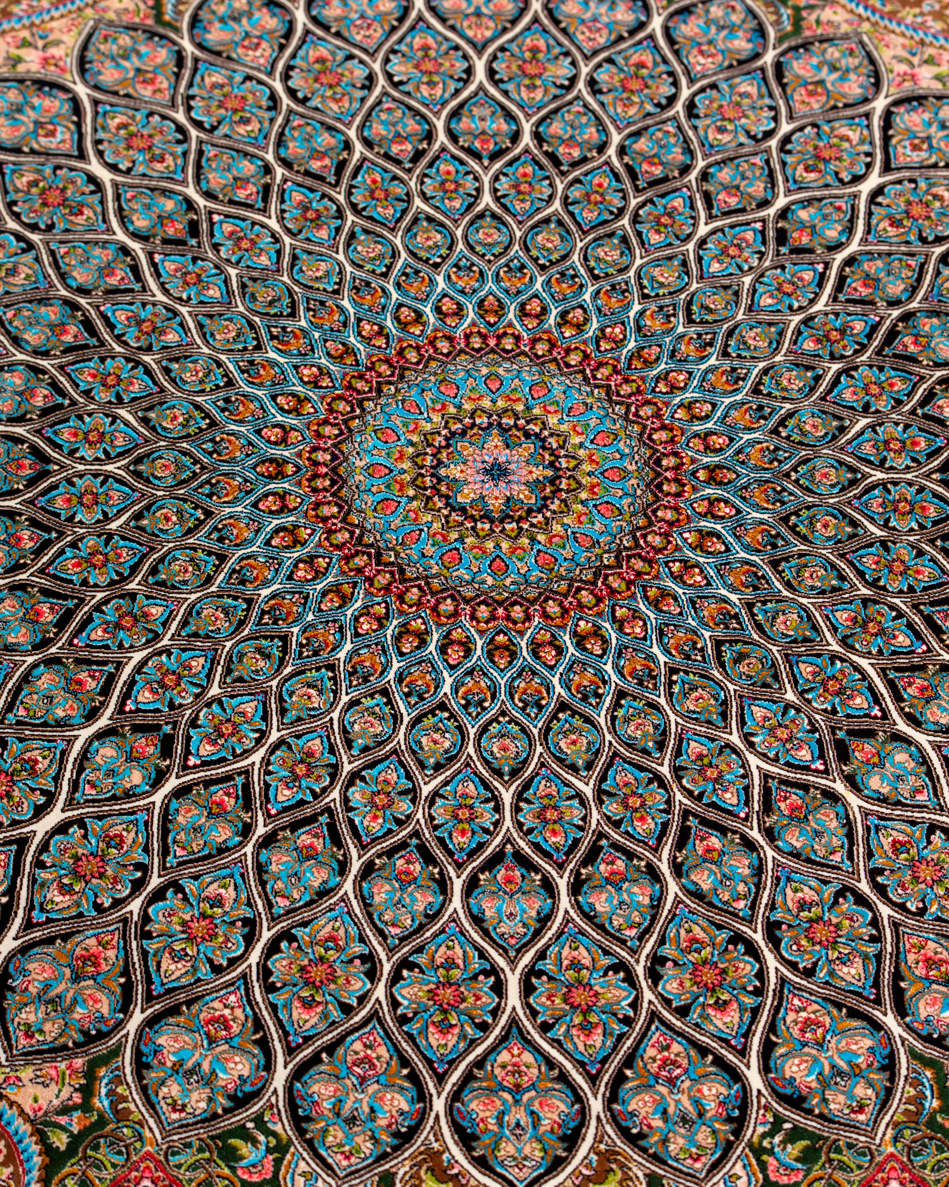 Central dome medallion detail of the Zumurrud green silk rug