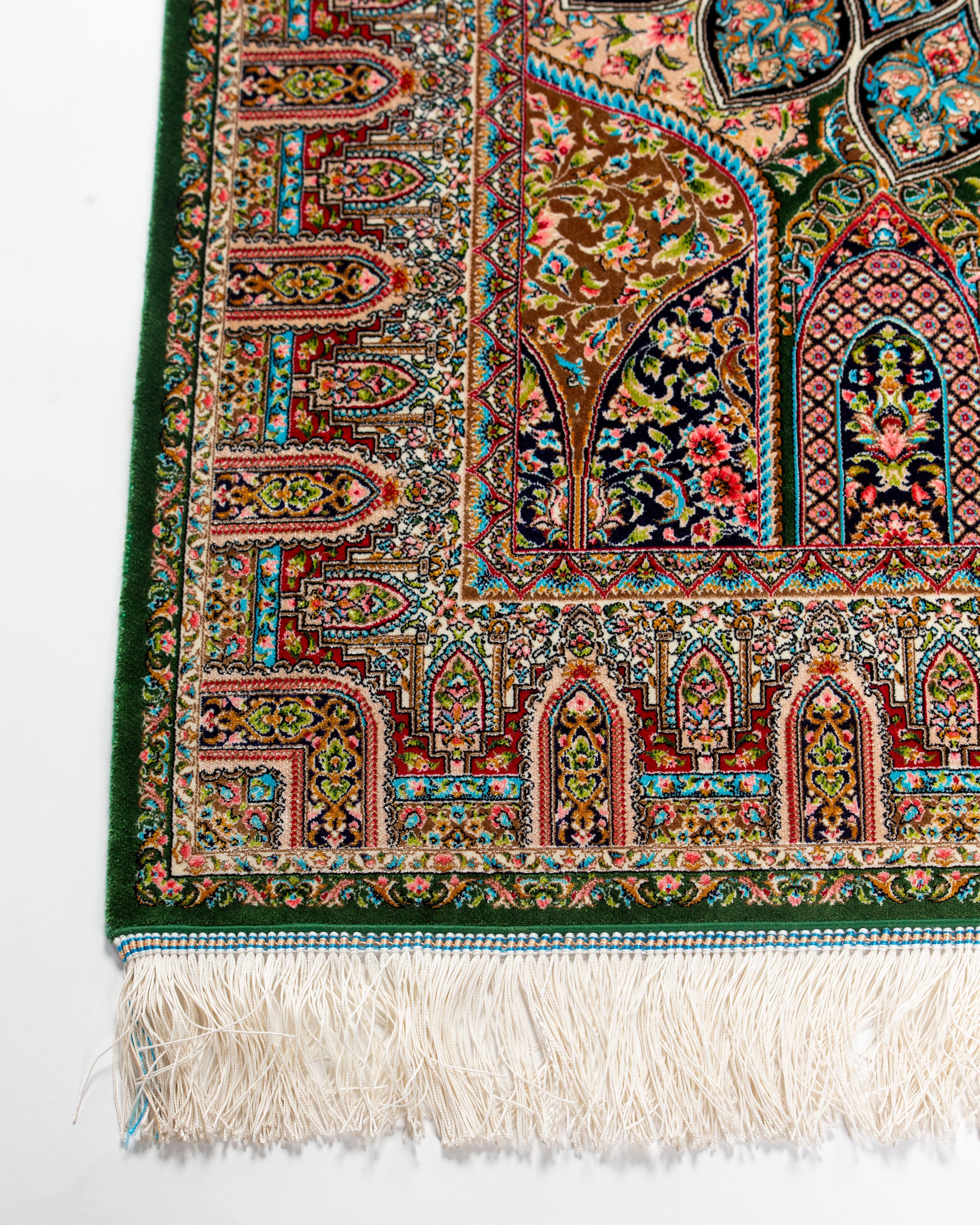 Dome and field detail of the Zumurrud silk rug