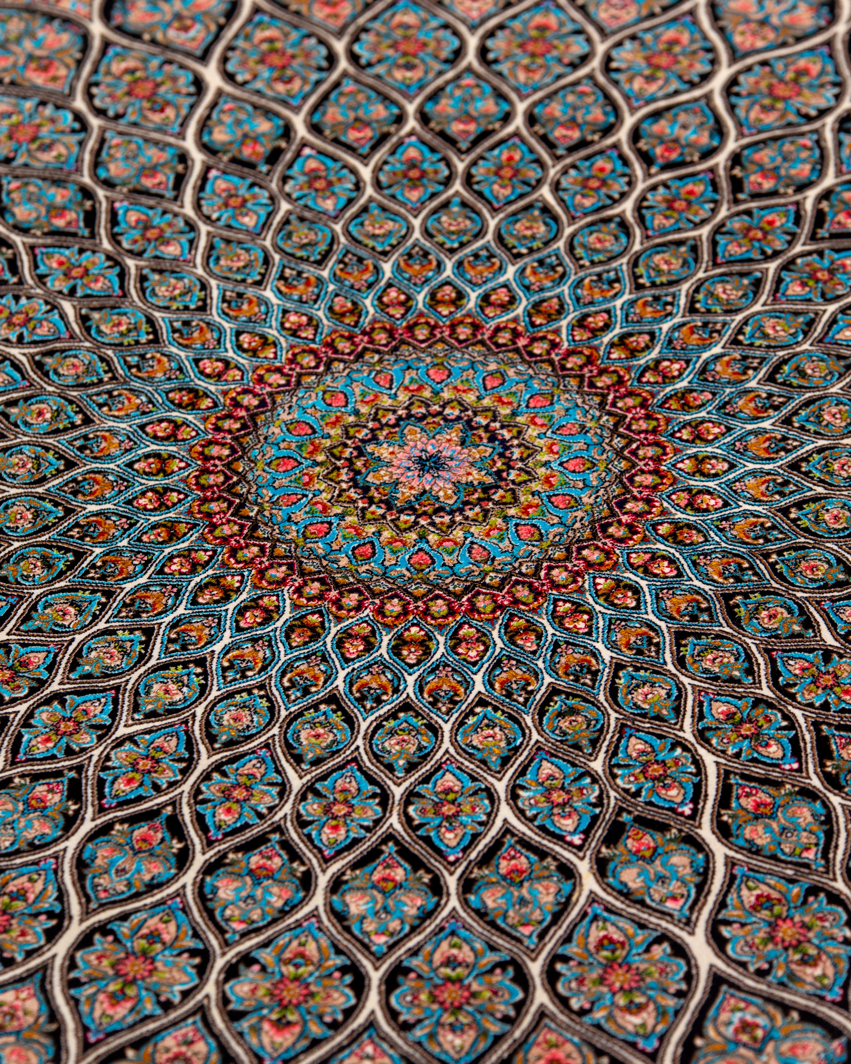 Close up of the dome medallion on the Zumurrud silk rug